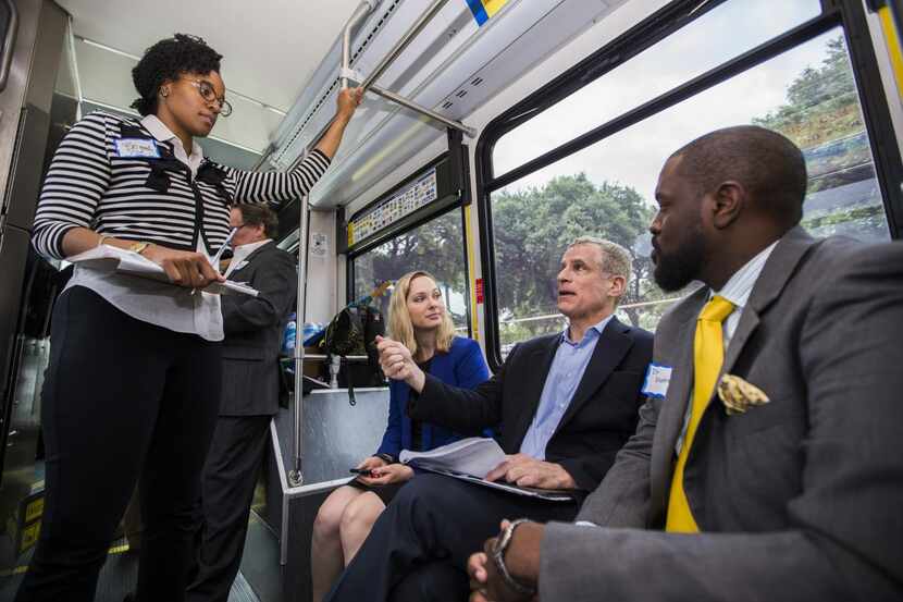 
Rob Kaplan (second from right), president of the Federal Reserve Bank of Dallas, talked...