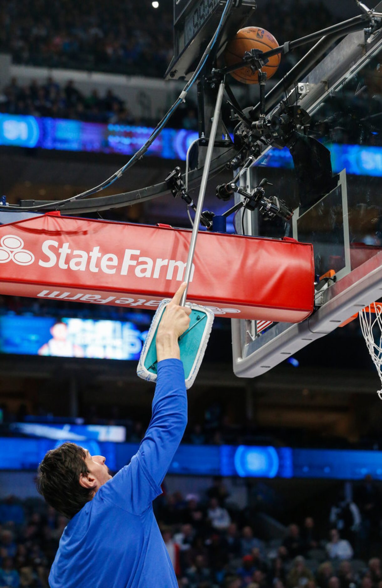 Dallas Mavericks center Boban Marjanovic (51) works to free the ball, which was lodge...