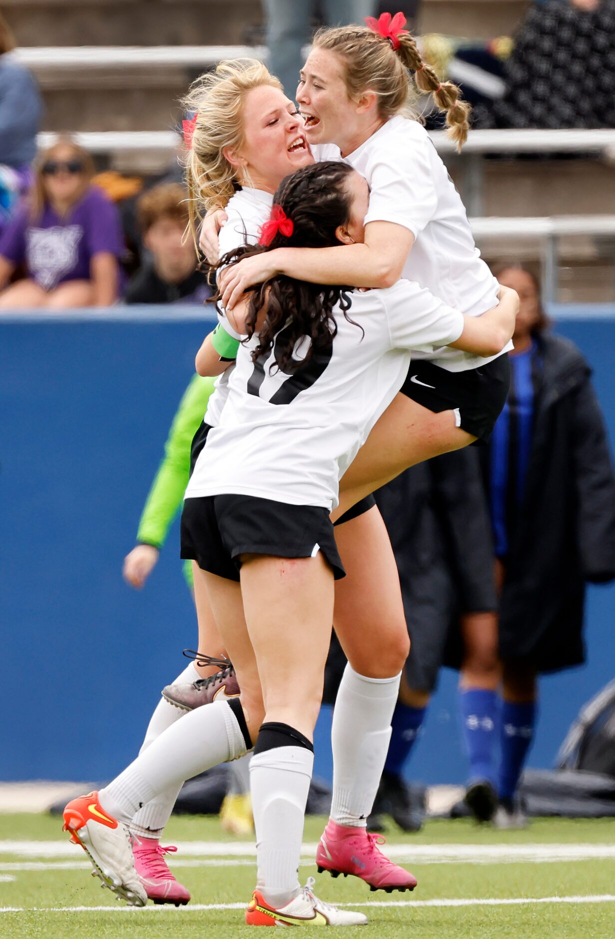 Flower Mound Marcus Chloe Adams (left) Carys Torgesen (19) and Allie Williams (right)...