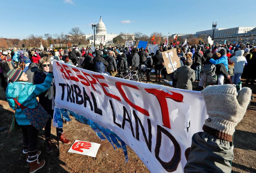 Demonstrators gather on Capitol Hill in Washington, Saturday, Dec. 10, 2016, to protest the...