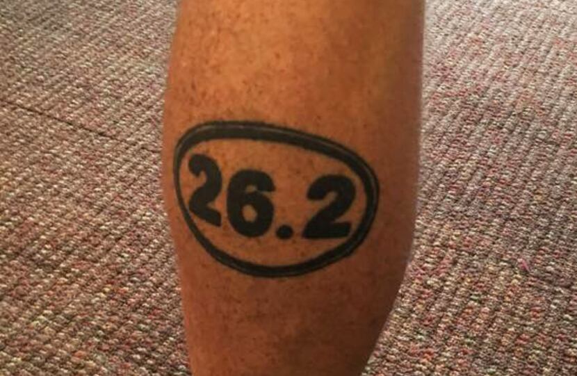 Dallas' Sean Jett celebrated his first marathon finish with a "26.2" tattoo on his calf.