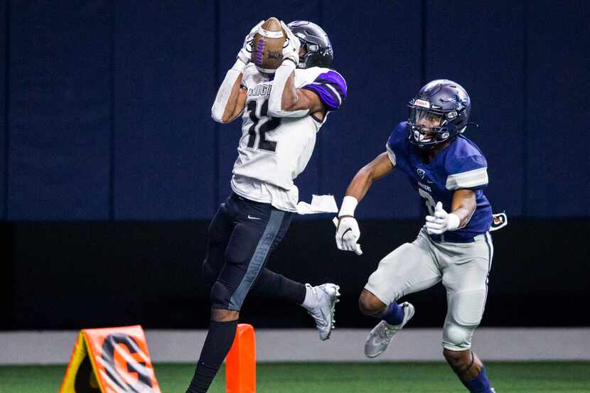 Frisco Independence receiver Zhighlil McMillan (12) catches a pass ahead of Frisco Lone Star...