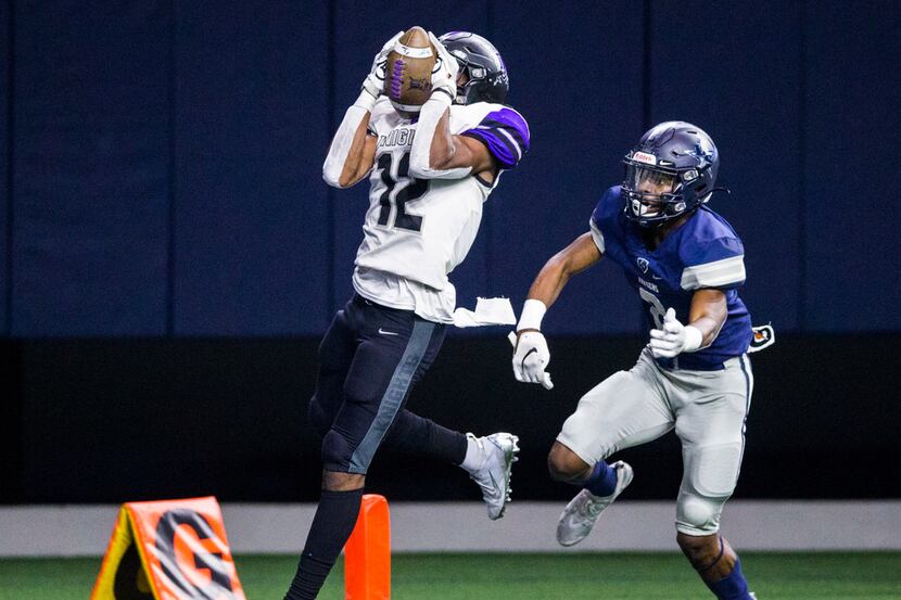 Frisco Independence receiver Zhighlil McMillan (12) catches a pass ahead of Frisco Lone Star...