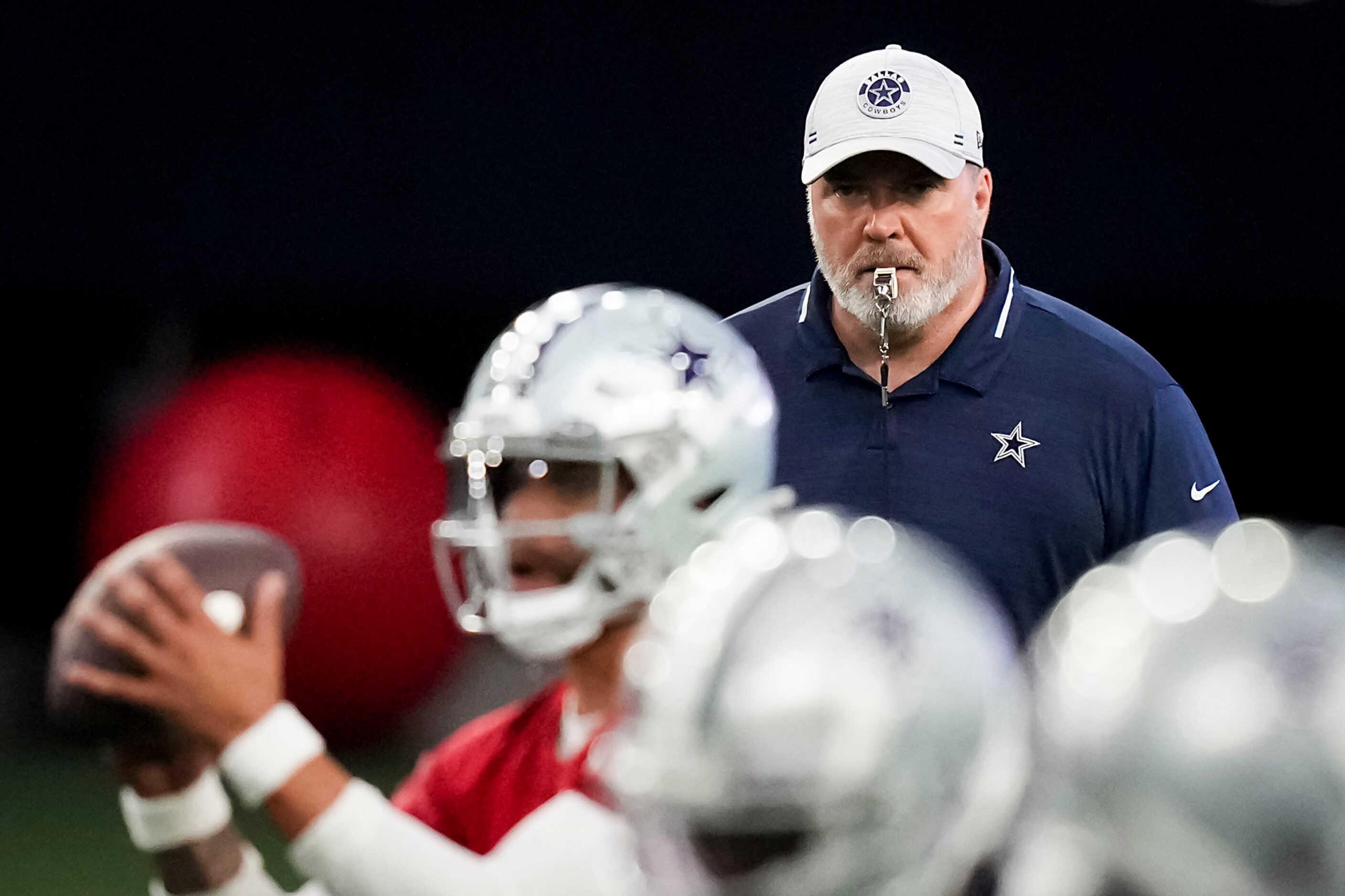 Dallas Cowboys head coach Mike McCarthy looks on as quarterback Dak Prescott (4) takes a...