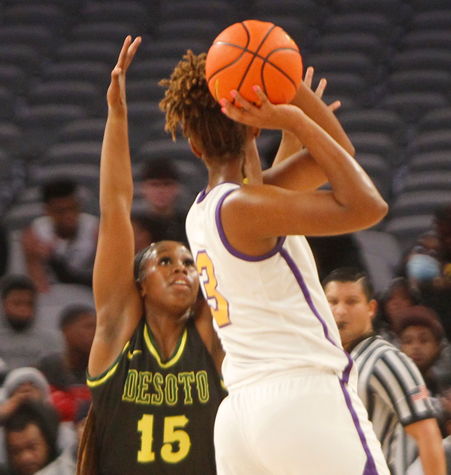 DeSoto senior Michayla Gatewood (15) defends against Montverde Academy forward Janiah Barker...