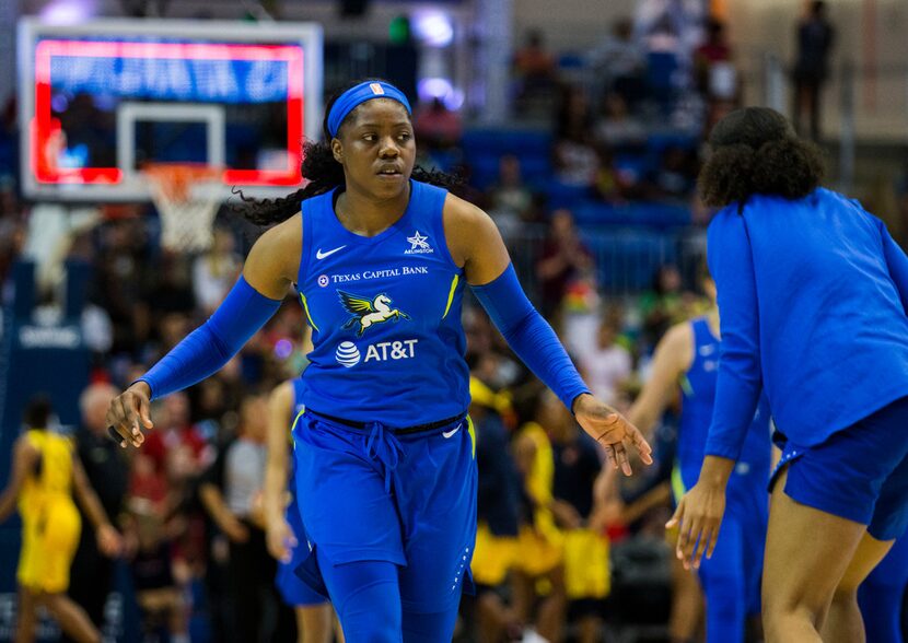 Dallas Wings guard Arike Ogunbowale (24) walks off the court at halftime of a WNBA game...