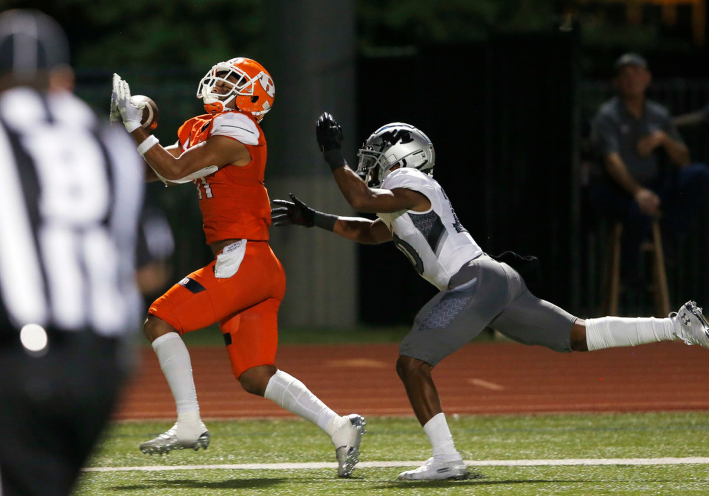 Rockwall's Jaxon Smith-Njigba (11) catches a pass for a touchdown in front of Arlington...