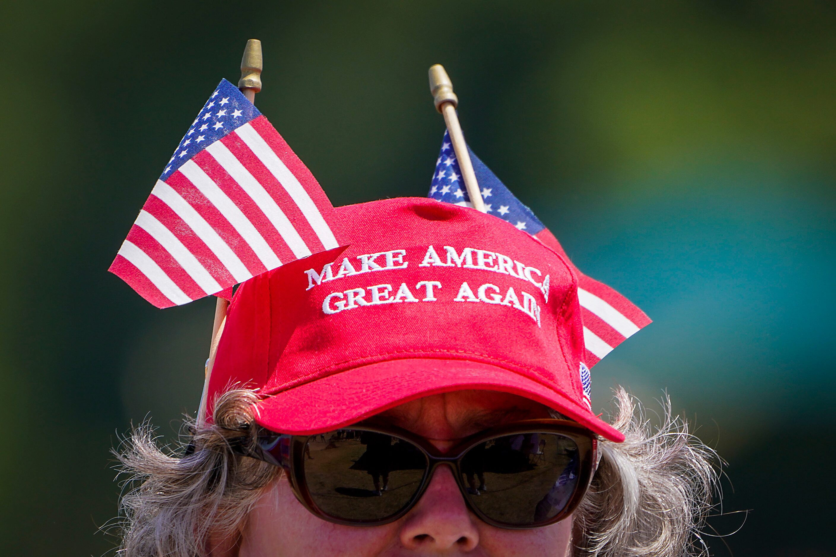 Supporters of President Donald Trump listen as Shelley Luther, owner of Salon  la Mode,...