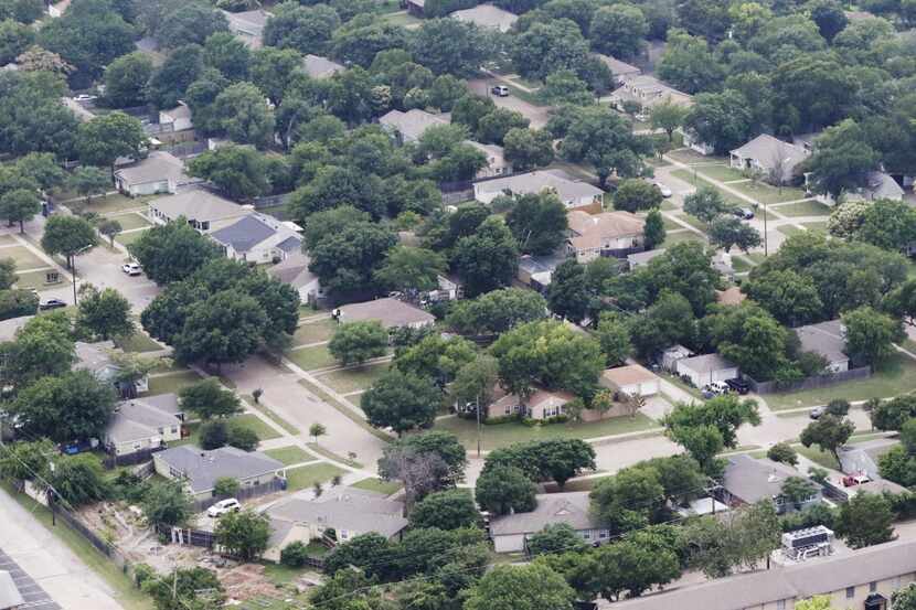 An aerial view of homes located close to the Casa Linda neighborhood on Wednesday, May 25,...