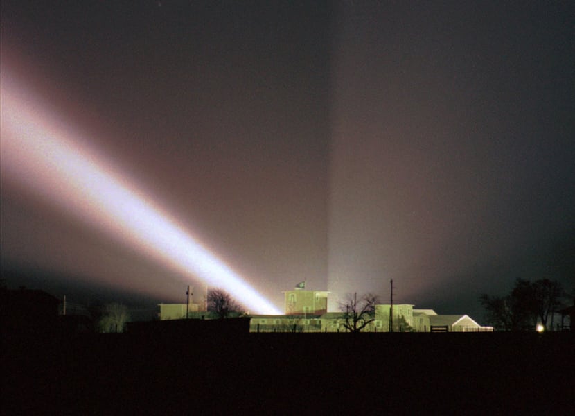A spotlight shines over the compound. Agents flooded the Davidians with light and blasted...