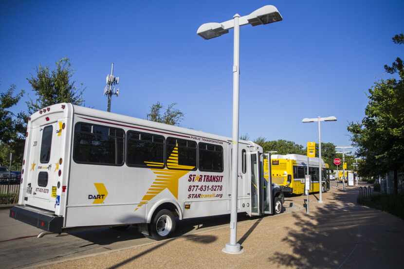 A Star Transit bus stops at the DART Lawnview Station in Dallas. Star Transit is launching a...
