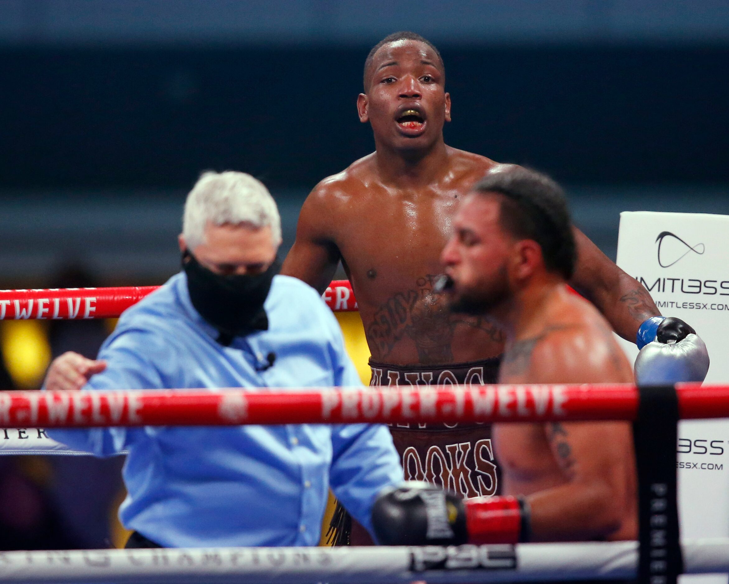 Burley Brooks reacts after the ref gave Marco Delgado a minute after a low blow from Brooks...