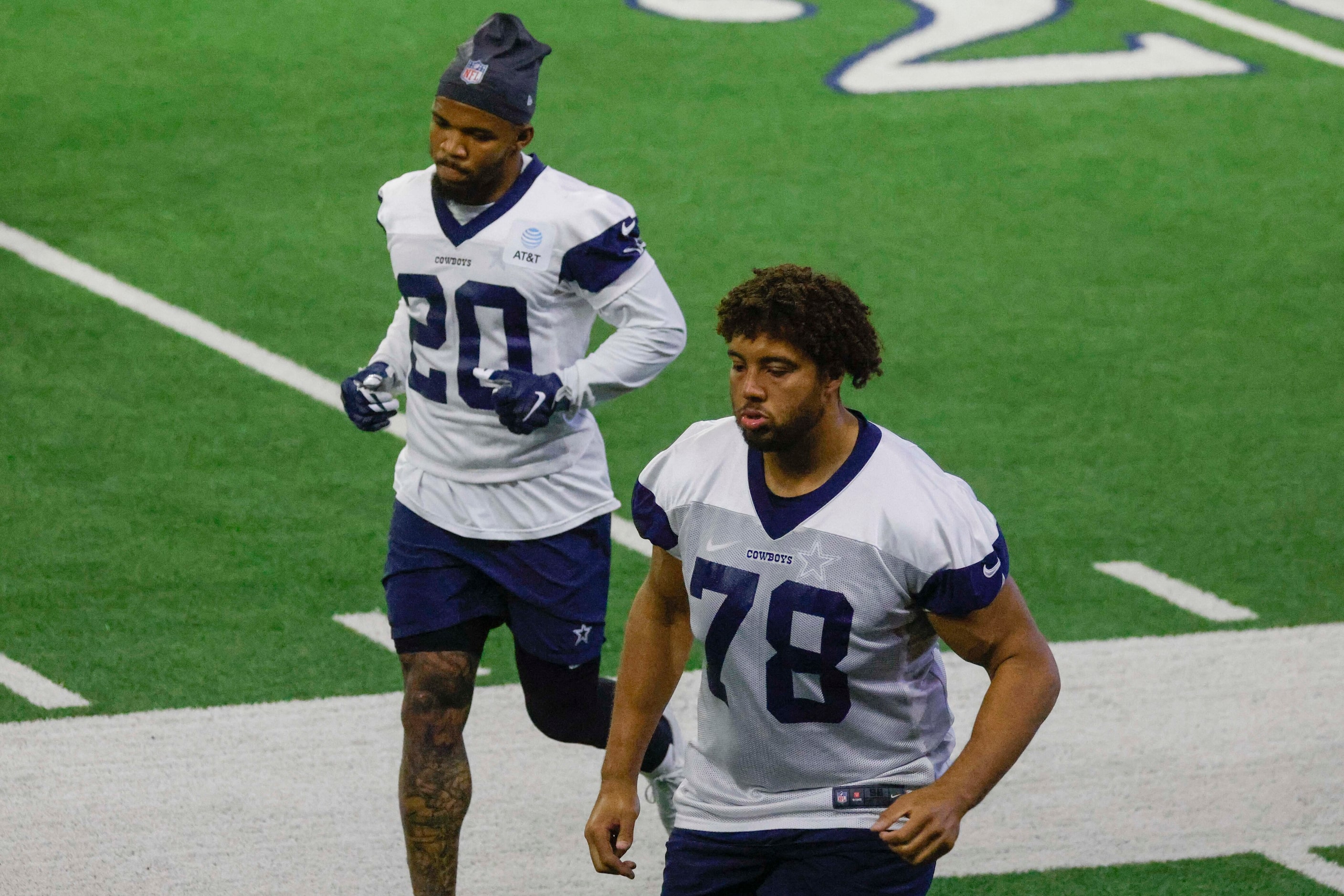 Dallas Cowboys offensive tackle Terence Steele (right) and  running back Tony Pollard (left)...