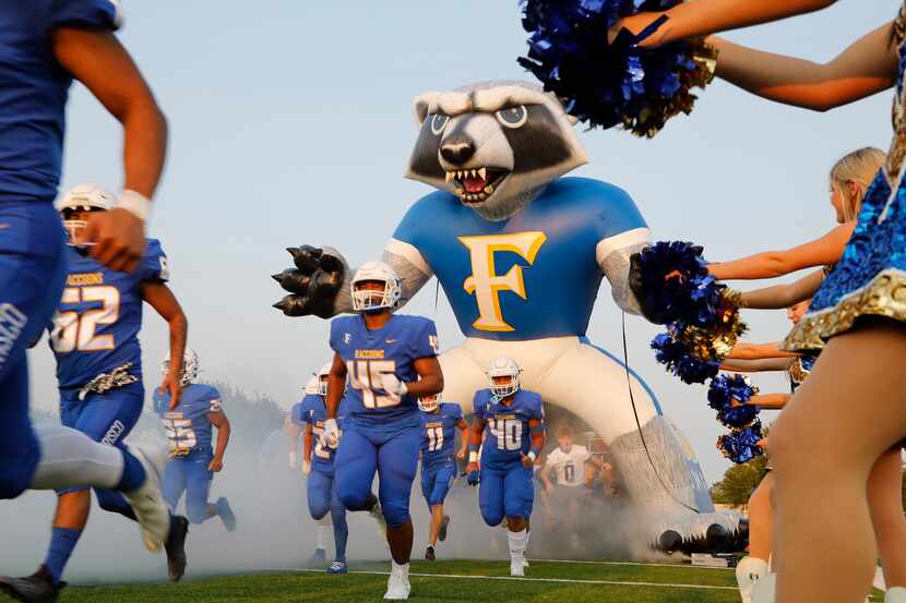 The Frisco High School football team takes the field as Frisco High School hosted Lake...