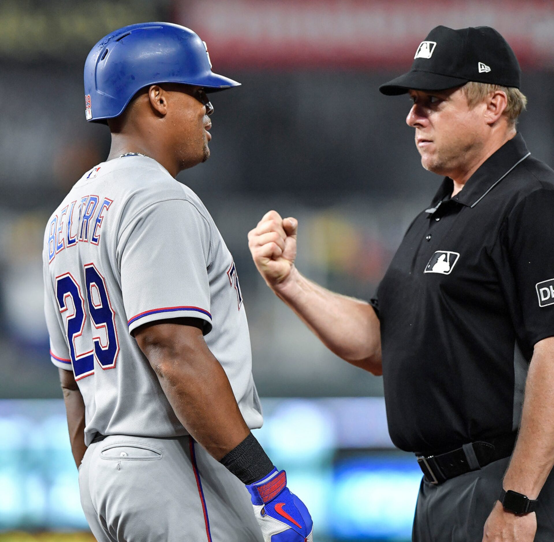 First base umpire Bruce Dreckman calls Texas Rangers' Adrian Beltre out at first on a double...