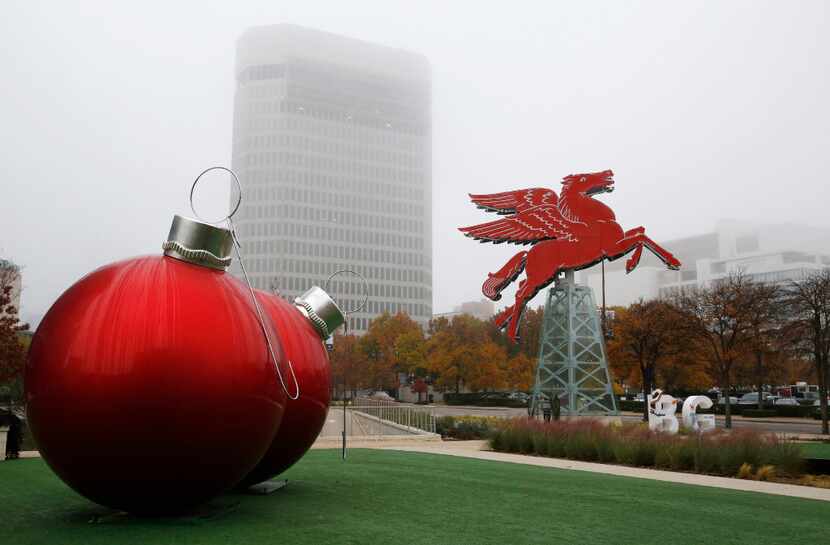 Visit the Omni Dallas Hotel's Christmas display of large Christmas ornaments near the...