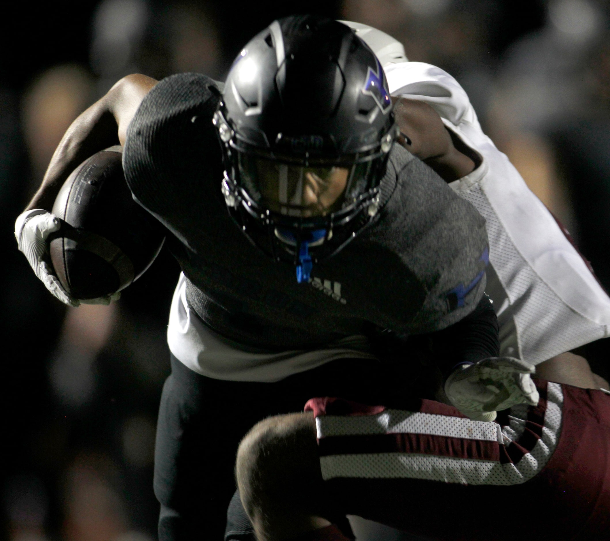 Hebron receiver Takoda Bridges (1) eyes the end zone but is stopped short of the goal by...