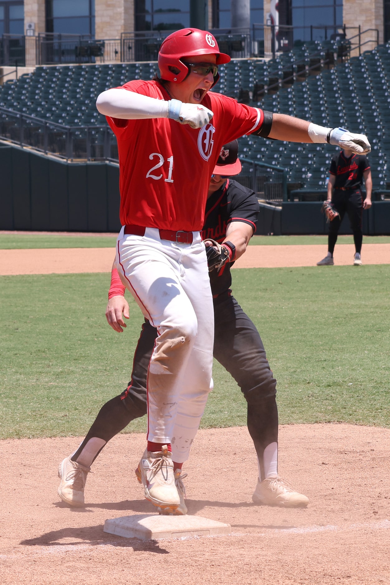 Grapevine designated hitter Lale Esquivel (21) celebrates after reaching 3rd base on a...