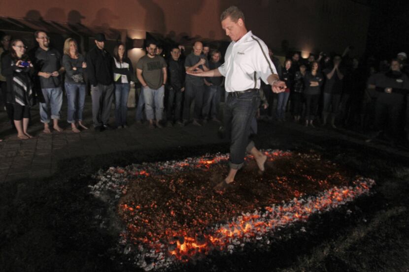 Gene Gray was first to walk across 1,200 degree coals at the Marriott last February.