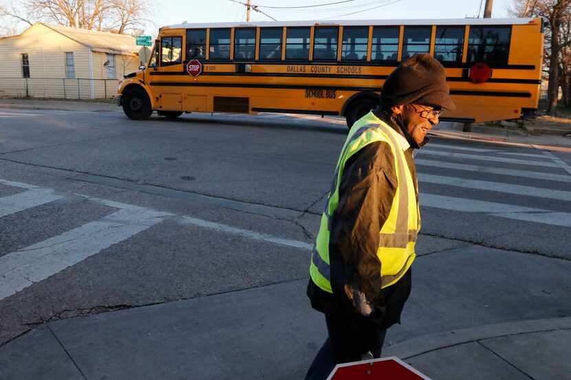 Russell Roberson, 77, has worked as a crossing guard for five years at Lorenzo De Zavala...