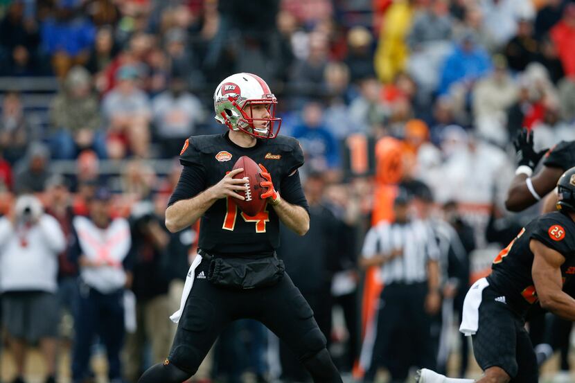 South Squad quarterback Mike White of Western Kentucky (14) during the first half of the...