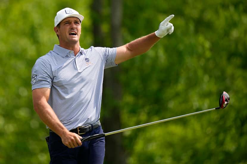 Bryson DeChambeau watches his tee shot on the fourth hole during the final round of the PGA...
