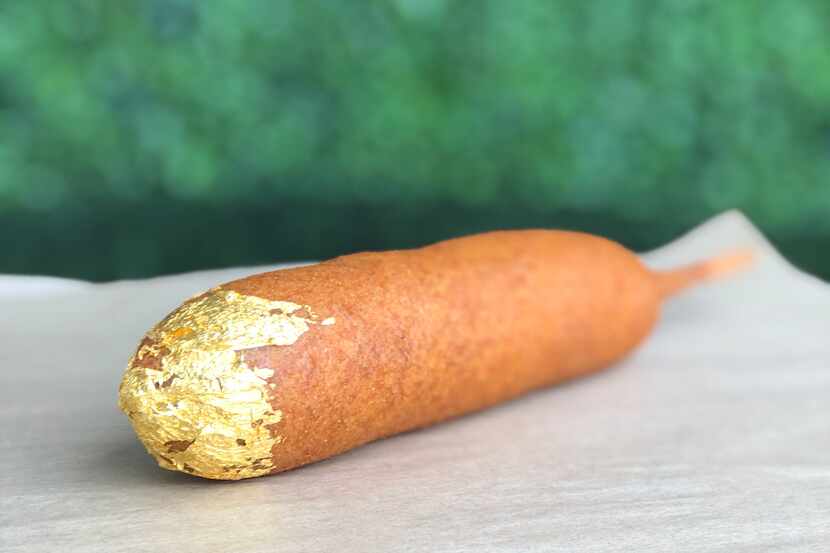 The corn dog crusted with 24-karat gold costs $24 at CornDog With No Name, a restaurant in...