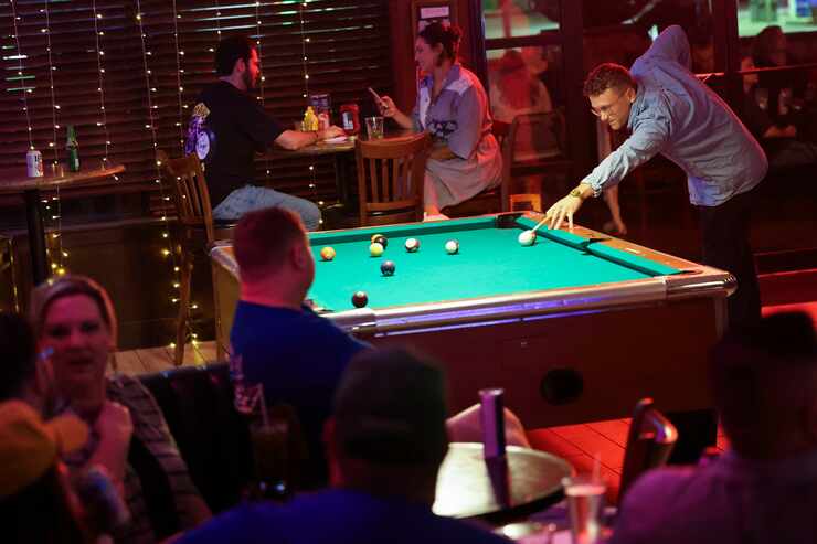 The pool table moved from the Stoneleigh P on Maple Avenue to its new address on Dallas'...