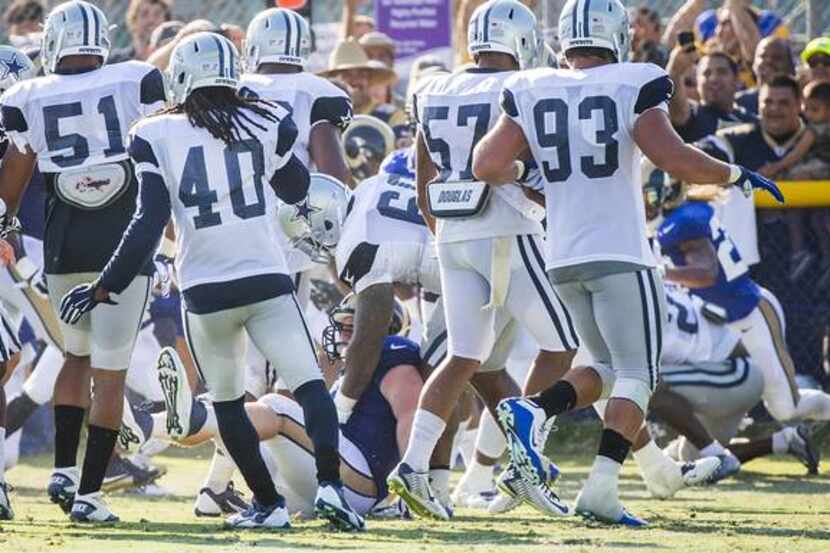 Cowboys and Rams players brawl during Tuesday's practice.