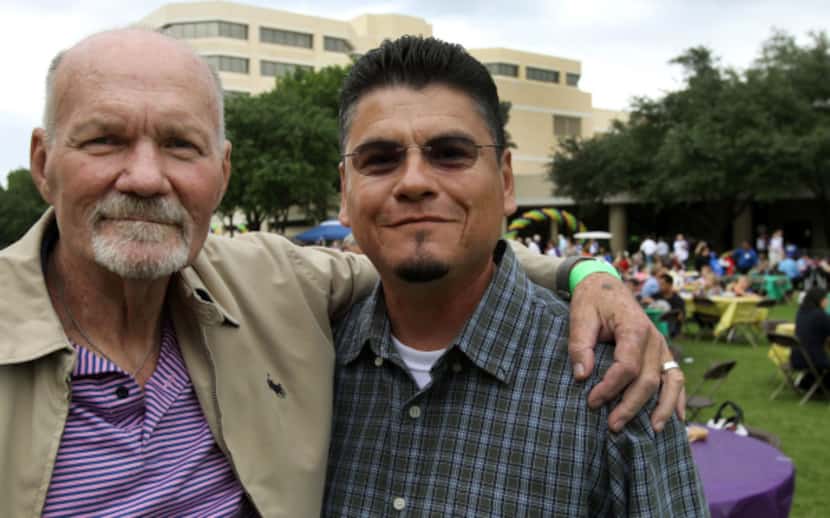 Larry Mooneyham (left), with Juan Espino at the reunion, received the liver of Espino’s wife...