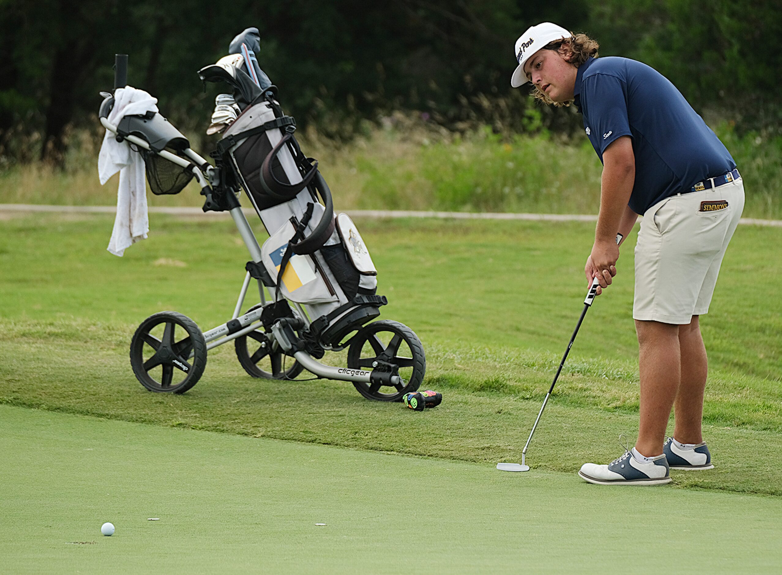 Brooks Simmons putts on his last hole during Day 2 of the UIL 6A boys golf state tournament...