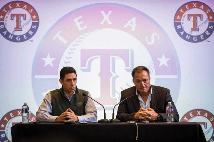Texas Rangers general manager Jon Daniels (left) and manager Jeff Banister address a press...