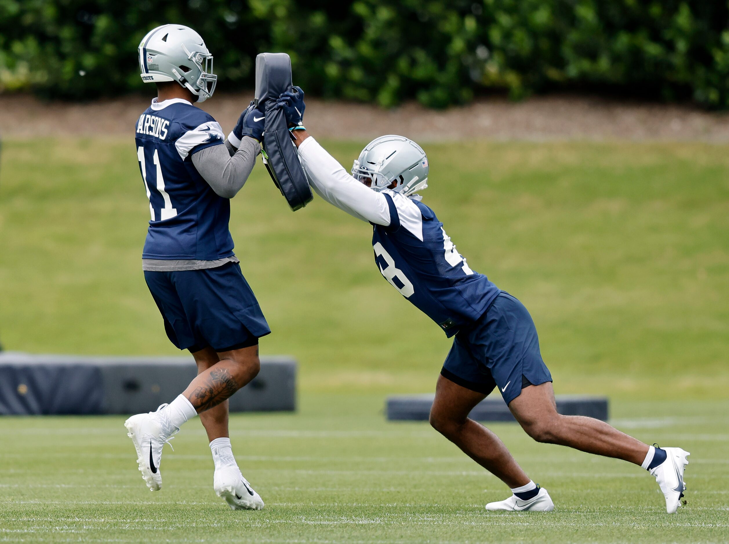 Dallas Cowboys rookie linebacker Micah Parsons (11) and rookie linebacker Jabril Cox (48)...