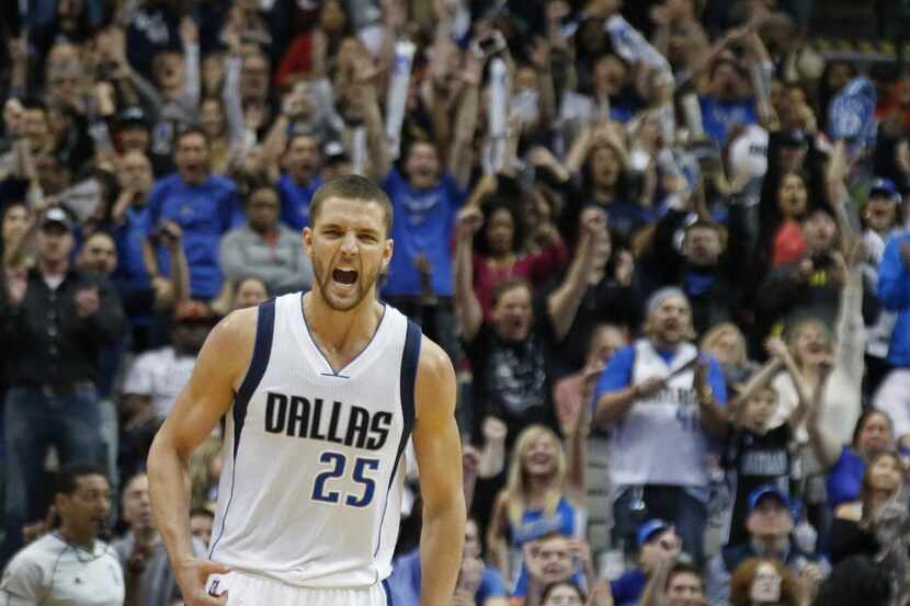 Dallas Mavericks forward Chandler Parsons (25) reacts after hitting a big shot in overtime...