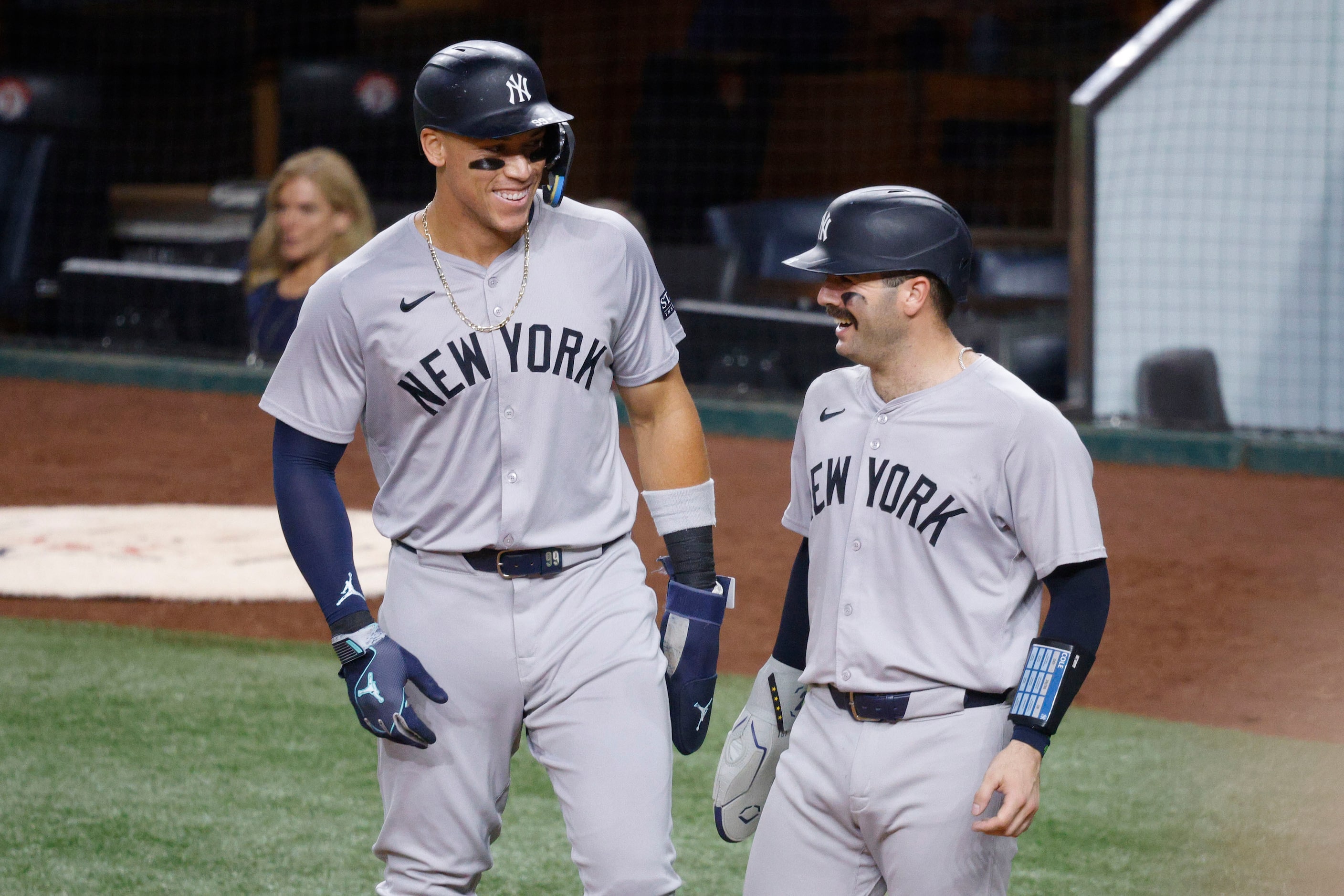 New York Yankees outfielder Aaron Judge (99), left, and New York Yankees catcher Austin...