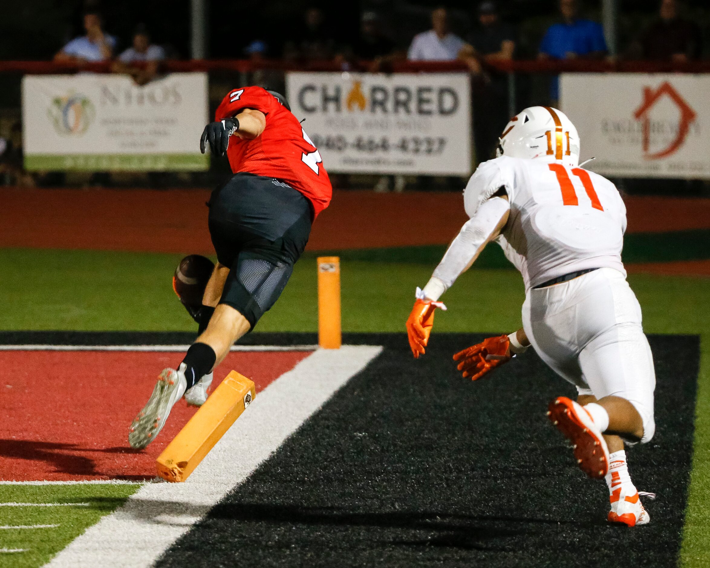 Argyle defensive back Jett Copeland (7) returns an interception for a touchdown ahead of...