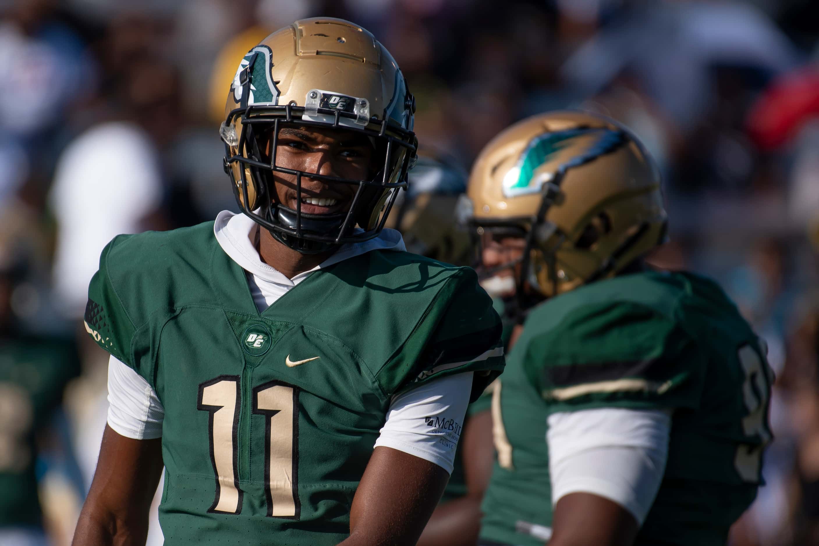 DeSoto senior DeMichael Porter (11) smiles after making a play during DeSoto’s home game...