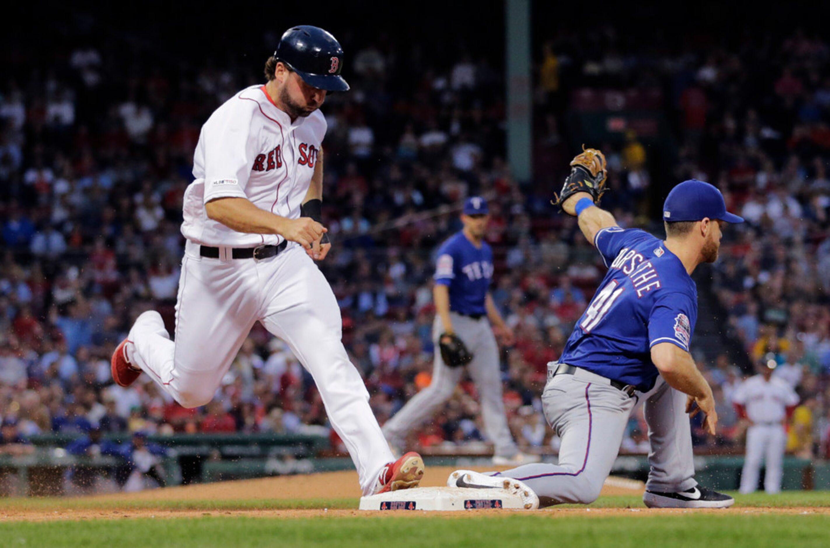 Texas Rangers first baseman Logan Forsythe (41) makes a force-out on a groundout by Boston...