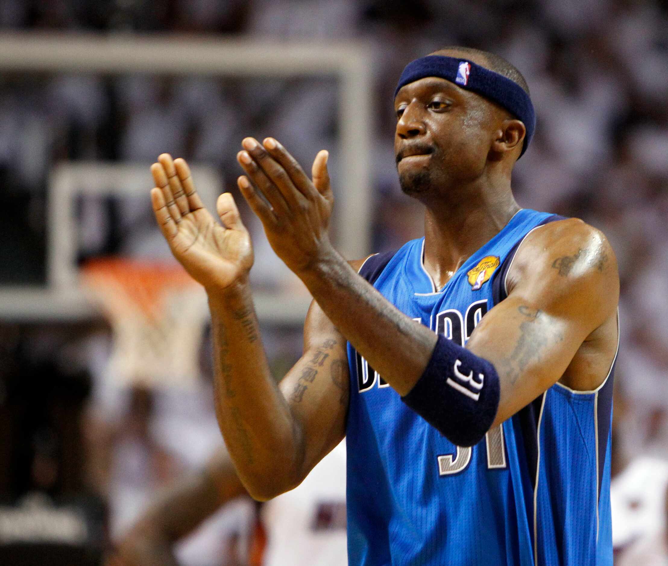 Dallas Mavericks shooting guard Jason Terry (31) aplaudes in a game against the Miami Heat...