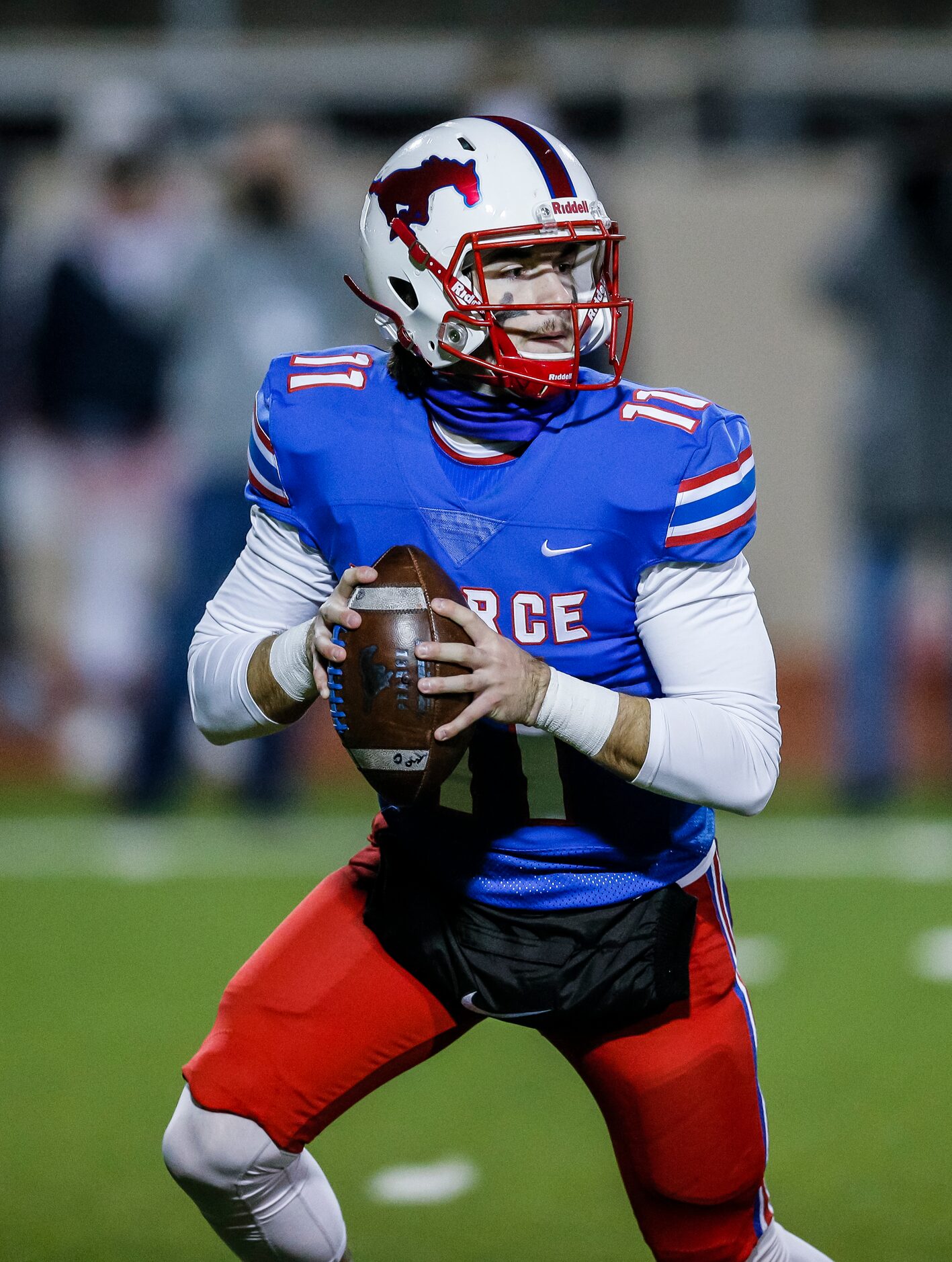 JJ Pearce senior quarterback Burke Wahlberg (11) looks for an open receiver during the first...