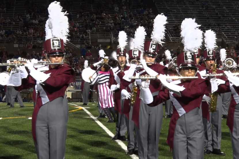 Members of the Plano Senior High School marching band are shown here in a screenshot of a...