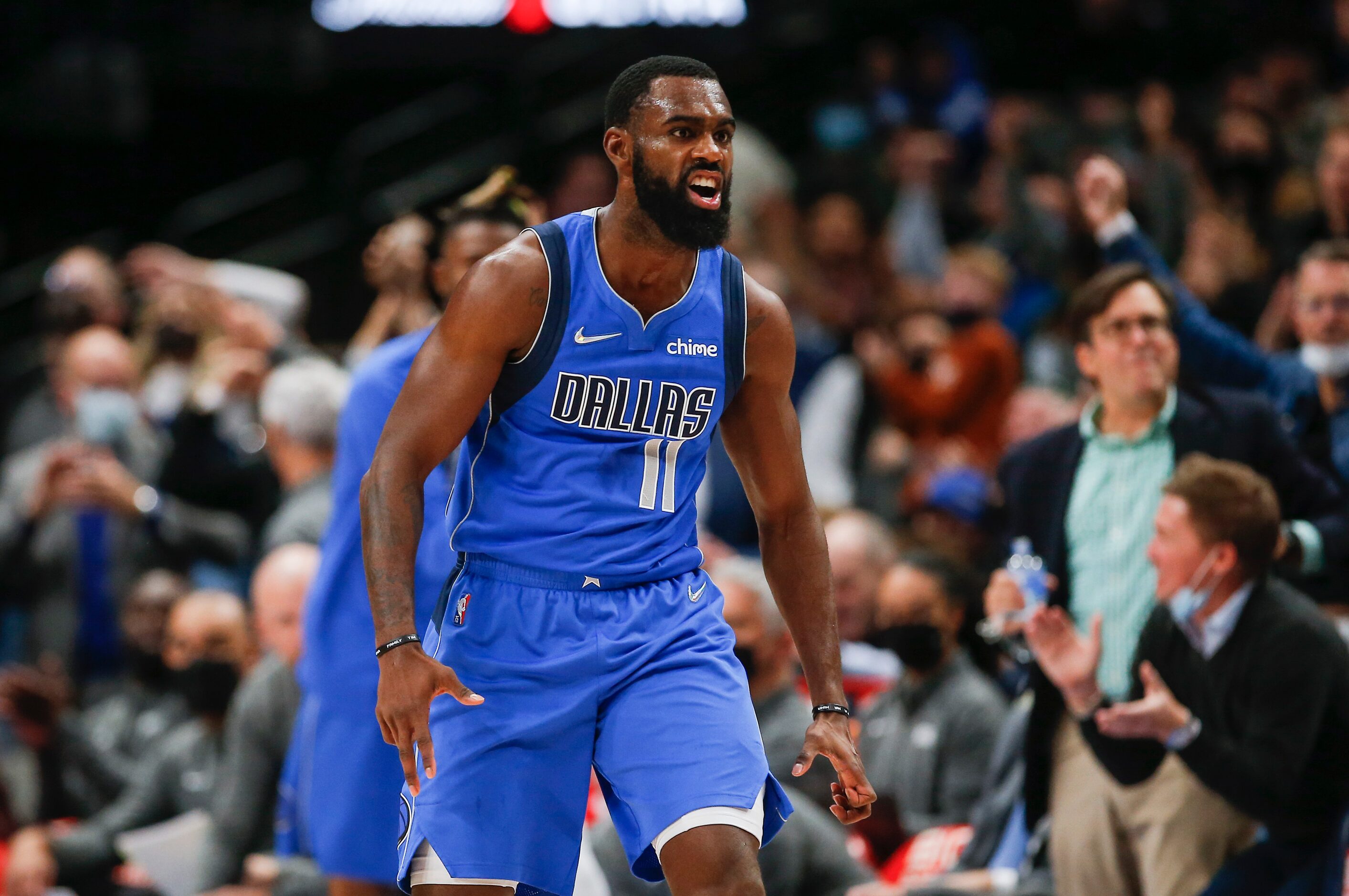 Dallas Mavericks forward Tim Hardaway Jr. (11) celebrates a three-point shot during the...