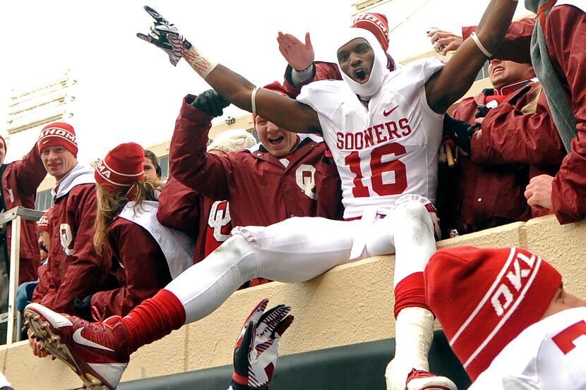 Oklahoma Wide Receiver Jaz Reynolds celebrates with fans after their 34-24 win over Oklahoma...