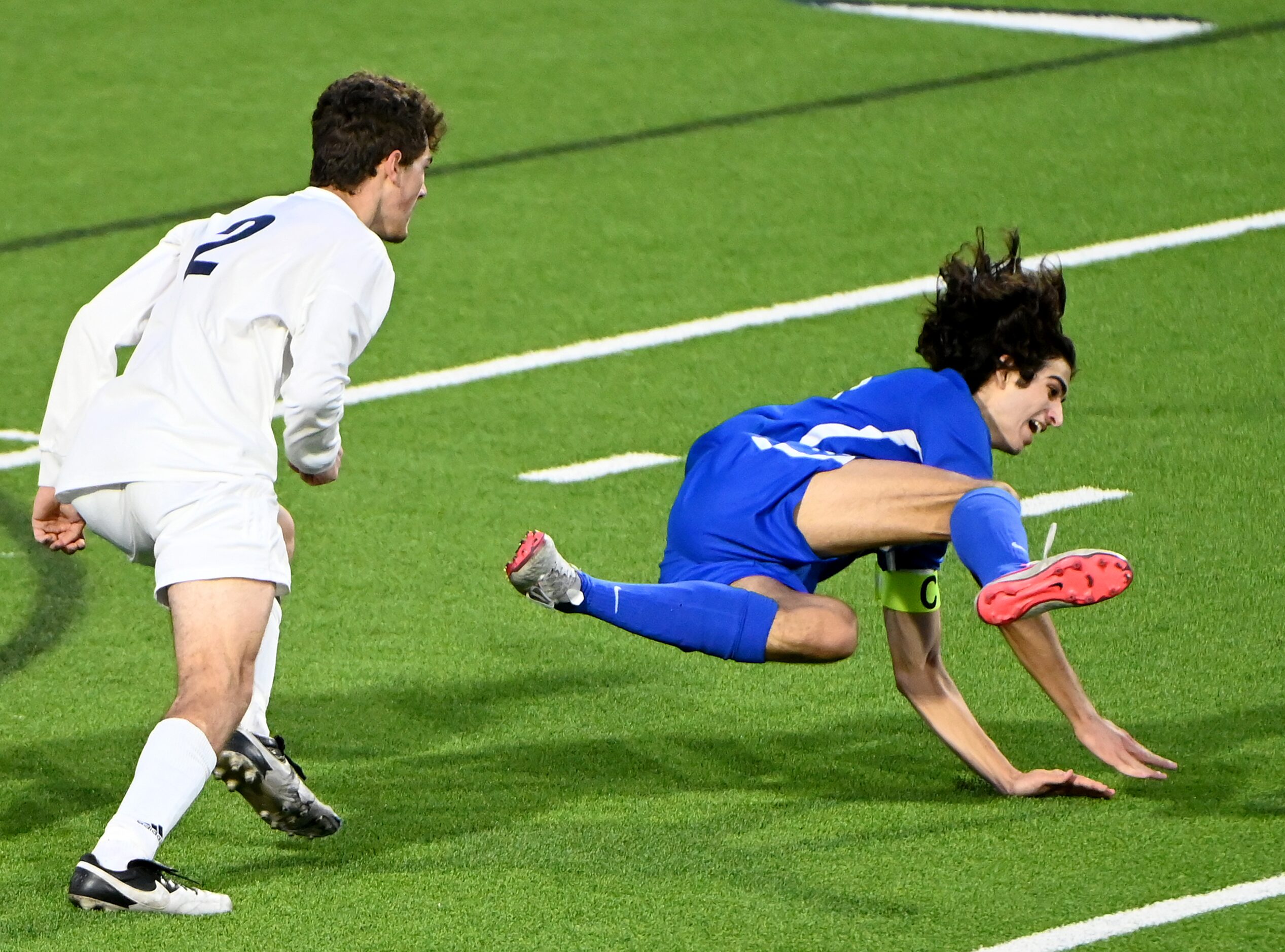 Allen’s Sam Presser (10) draws a foul from Flower Mound’s Cambren Sievert (2) in the second...