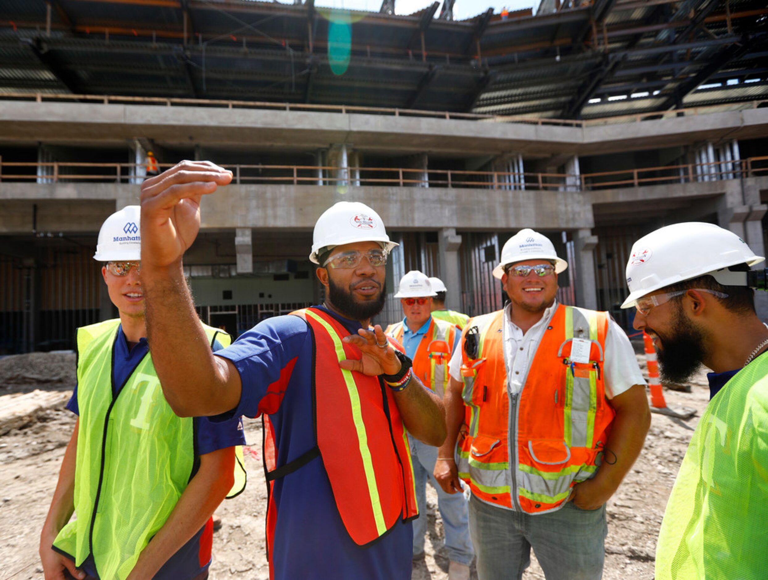 Texas Rangers shortstop Elvis Andrus (second from left) and second baseman Rougned Odor...