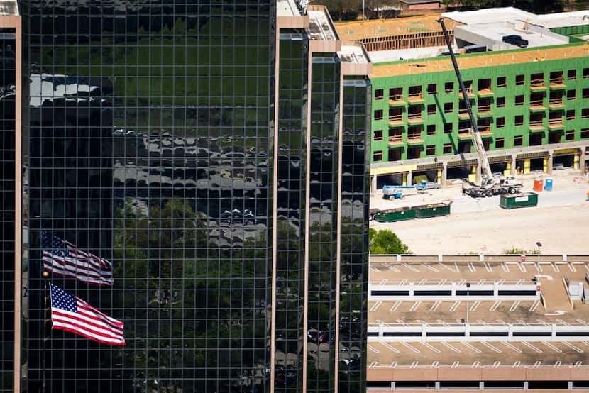 Construction on the Palisades Central project in Richardson is seen in an aerial view March...