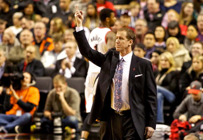 Nov 25, 2013; Portland, OR, USA; Portland Trail Blazers head coach Terry Stotts calls a play...