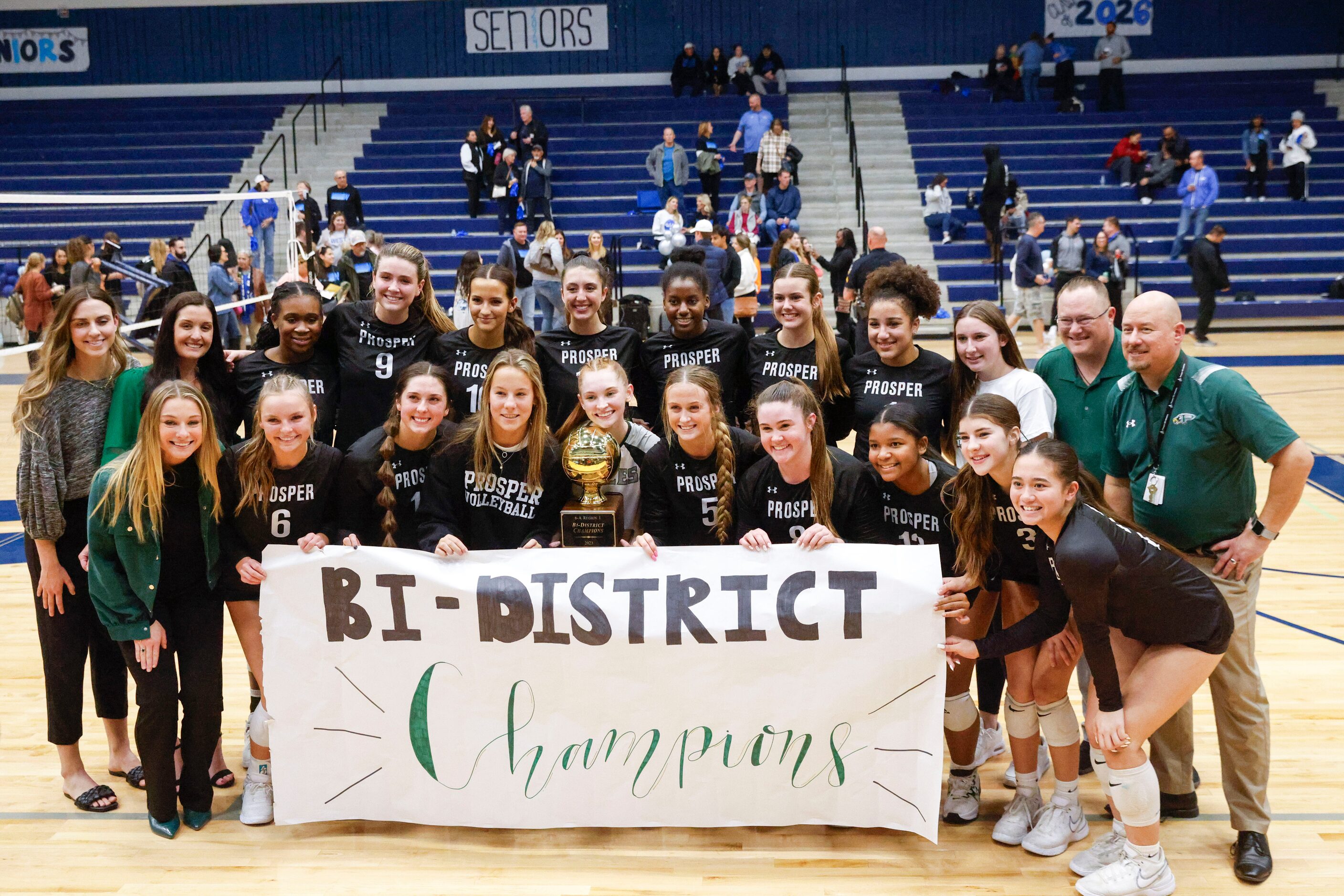 Prosper high’s players pose for photo after winning against Plano West during class 6A...