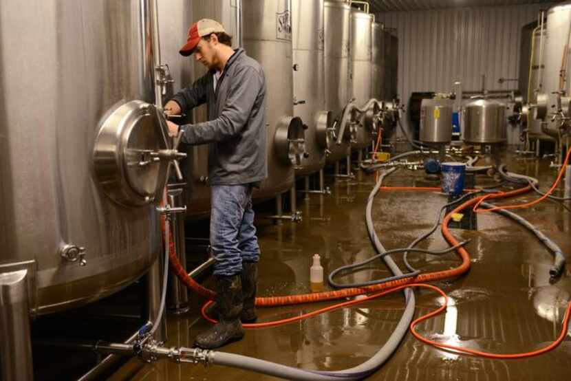 
Brewer Daniel Thompson works in the cooler  at Franconia Brewing Company in McKinney....