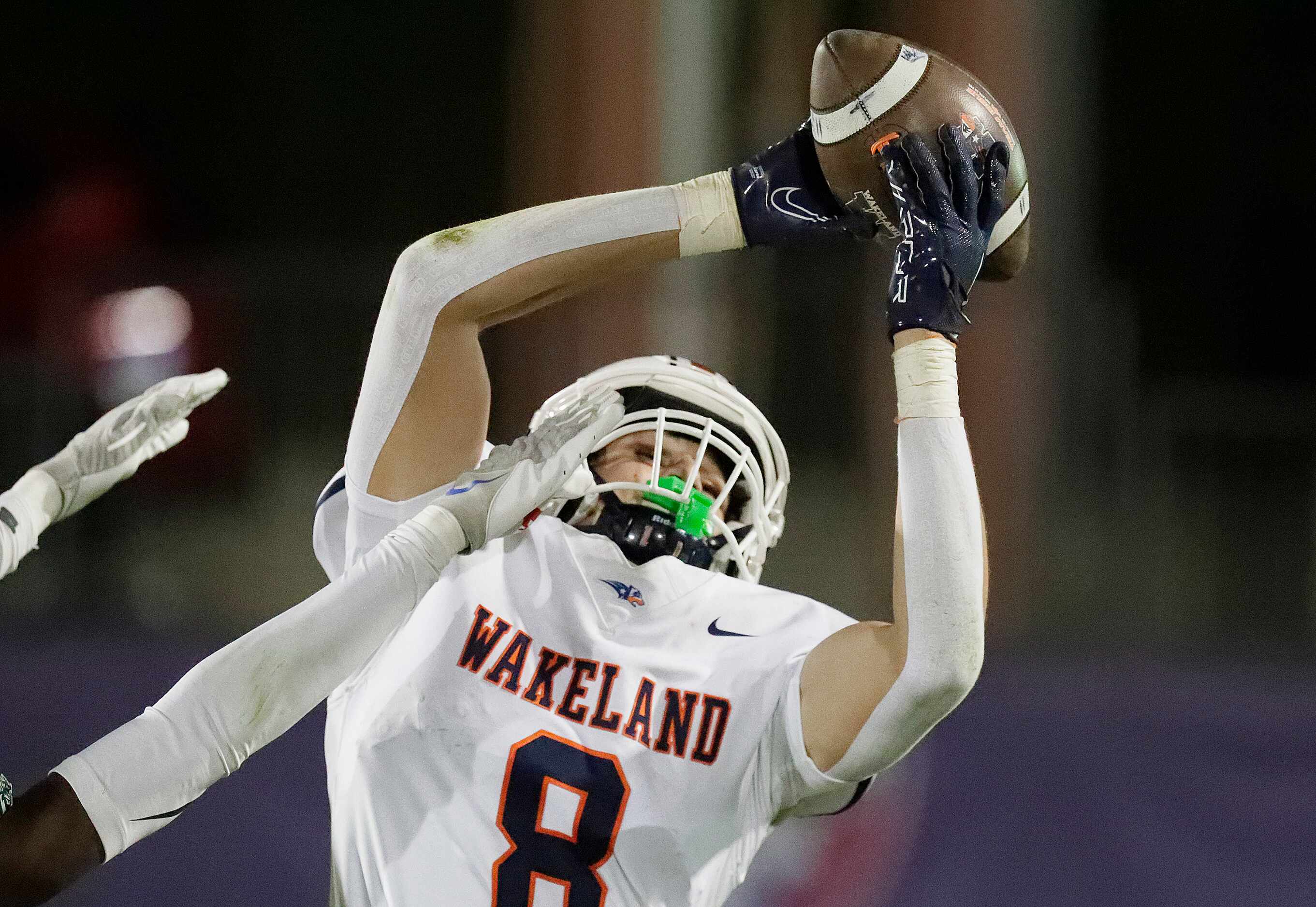 Wakealnd High School wide receiver Ryder Treadway (8) makes the catch and goes on to score a...